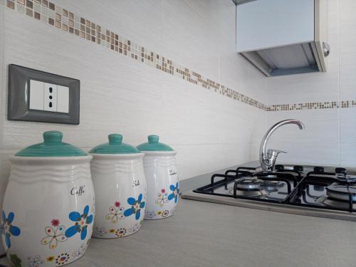 Una cocina o zona de cocina en Appartamenti Blu Mare