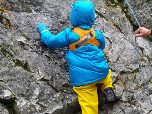 a person on a rock wall with a rope at Apartement Gute Laune in Mieming