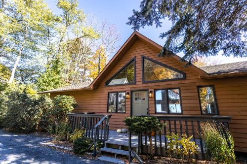 a home with a wooden house at Wildcat Chalet in Seven Devils