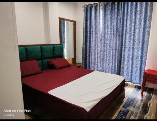 Lova arba lovos apgyvendinimo įstaigoje Sangam Resort & Hotel