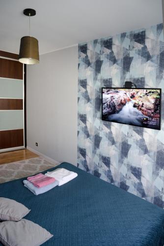 Postel nebo postele na pokoji v ubytování Pirs Apartament Gdynia - apartament na wyłączność