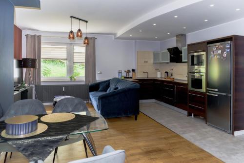 Kuchyň nebo kuchyňský kout v ubytování Pirs Apartament Gdynia - apartament na wyłączność
