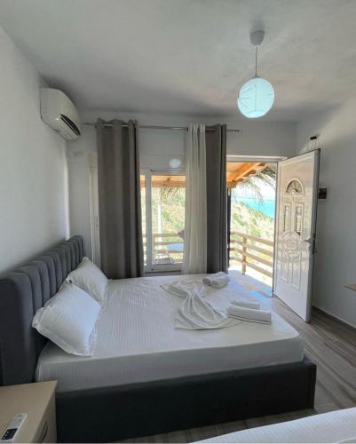 Postel nebo postele na pokoji v ubytování Vila Orizzonte blue