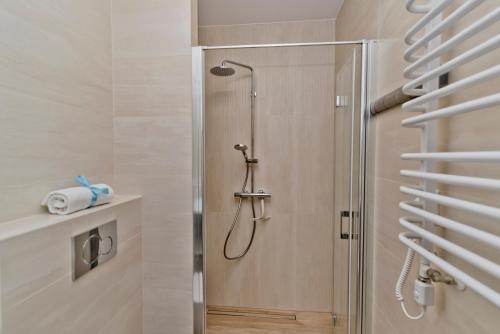 Ванная комната в BlueApart Apartamenty Portowa