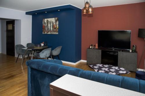 TV a/nebo společenská místnost v ubytování Pirs Apartament Gdynia - apartament na wyłączność
