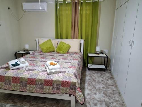 Postel nebo postele na pokoji v ubytování Angola Apartment "A"