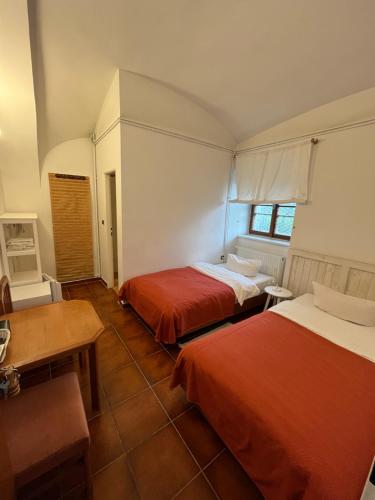 Postel nebo postele na pokoji v ubytování Penzion u Svatého Prokopa