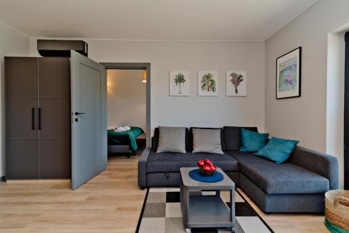 Гостиная зона в BlueApart Apartamenty Portowa