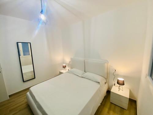 Llit o llits en una habitació de Villa Portofino by Sicilvill