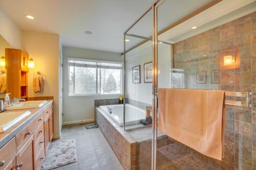 a large bathroom with a tub and a shower at Dog-Friendly Denver Vacation Home with Gas Grill! in Denver