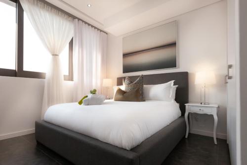 Voodi või voodid majutusasutuse Delight Luxurious Apartments 37 Angus road Bedfordview toas