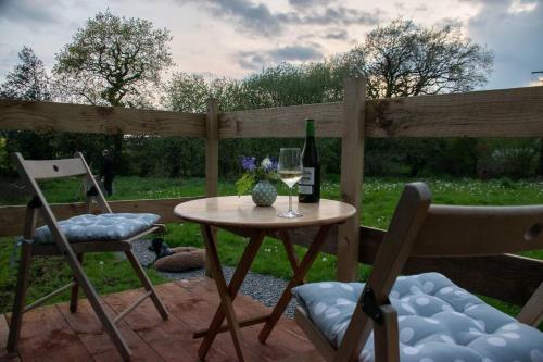 Shepherds Hut in enclosed field photo 10