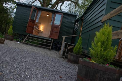 Shepherds Hut in enclosed field photo 18