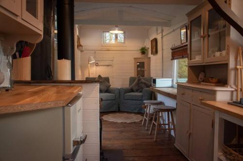 Shepherds Hut in enclosed field photo 9
