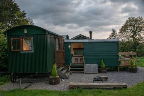 Shepherds Hut in enclosed field photo 7