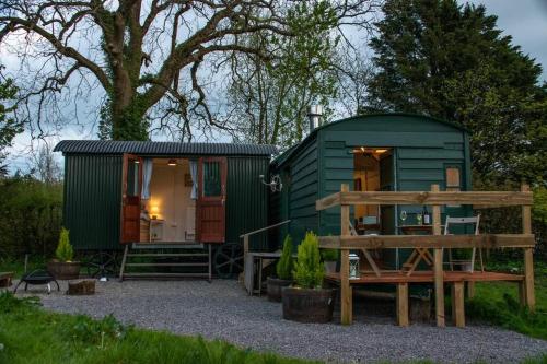 Shepherds Hut in enclosed field photo 19