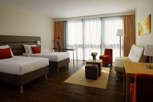 Postel nebo postele na pokoji v ubytování Residence Inn by Marriott Sarajevo