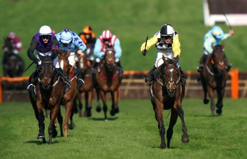 a group of horses racing on a track at Premium Deal l Hill View Home l Last-Minute Offer l Cheltenham l AJ Properties l Perfect for Short or Long Stays l 4Beds 4Bedrooms in Cheltenham