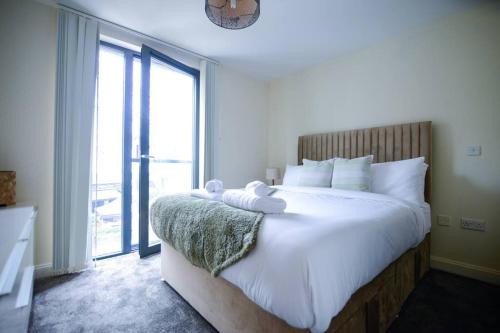 Ένα ή περισσότερα κρεβάτια σε δωμάτιο στο Stylish One Bedroom Apartment in Birmingham City Centre