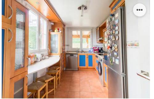 Kjøkken eller kjøkkenkrok på Habitaciones en chalet con jardín