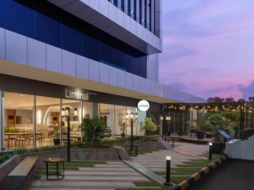 a rendering of the exterior of a building at Radisson Golf & Convention Center Batam in Batam Center