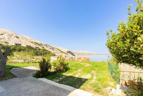 a view of the water from a house at Apartments with parking space Metajna, Pag - 208 in Metajna