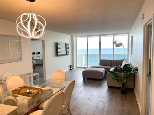 a living room with a view of the ocean at MAGNIFICENT 2 bedroom /2 bath beachfront with Beach View Condo apartment in Hollywood
