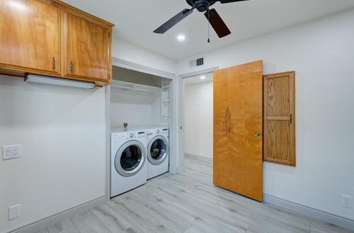 a laundry room with a washer and dryer at Updated Spacious Home in Fresno