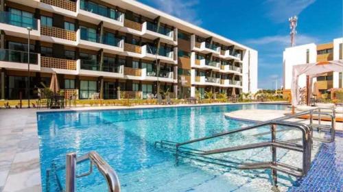 Der Swimmingpool an oder in der Nähe von Mana Beach Experience B 114, Porto de Galinhas