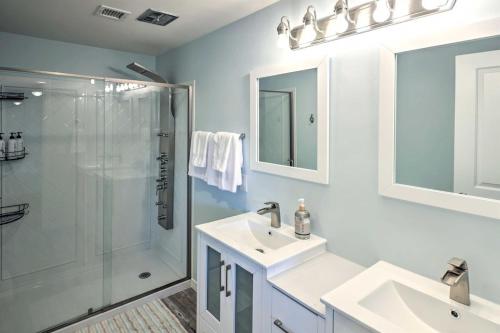 a bathroom with a shower and a sink and a mirror at Lush Waterfront, FamFriendly Home w/ Amazing Views! in Lake Havasu City