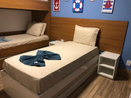 Una cama o camas en una habitación de La Fleur Polinesia Residence & Resort
