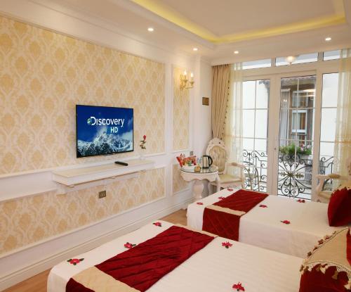 Hanoi Hotel Royalにあるベッド