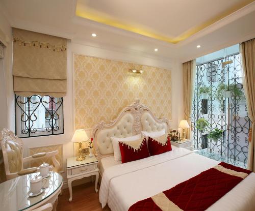 Hanoi Hotel Royalにあるベッド