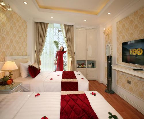 Hanoi Hotel Royalにあるベッド
