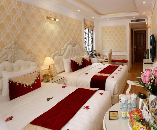 Hanoi Hotel Royalにあるベッド