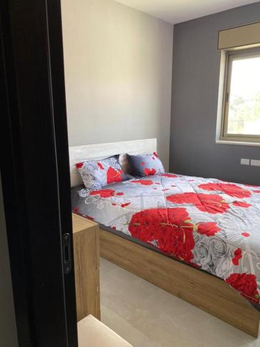 Ένα ή περισσότερα κρεβάτια σε δωμάτιο στο Sabrina Apartments
