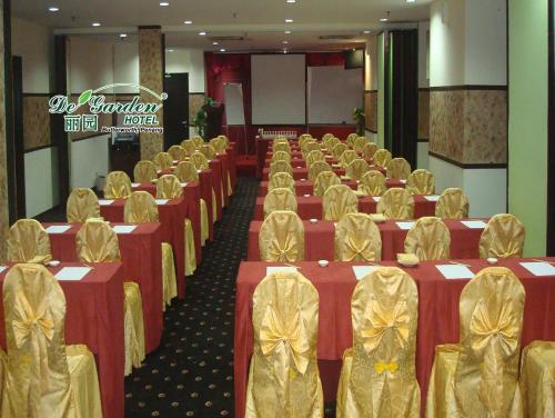 a banquet hall with red and gold tables and chairs at De' Garden Hotel, Butterworth in Butterworth