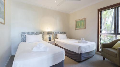 Cama o camas de una habitación en 1 The Point Apartments Port Douglas