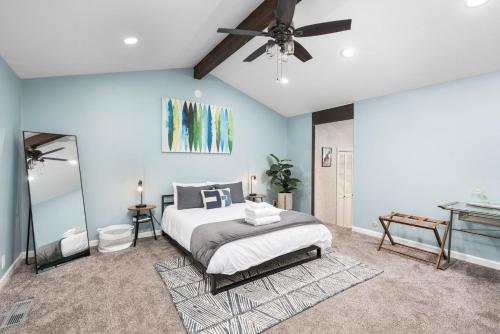 a bedroom with a bed and a ceiling fan at Mountain View, Hot Tub, Open Kitchen, 10m to Sequoia in Three Rivers