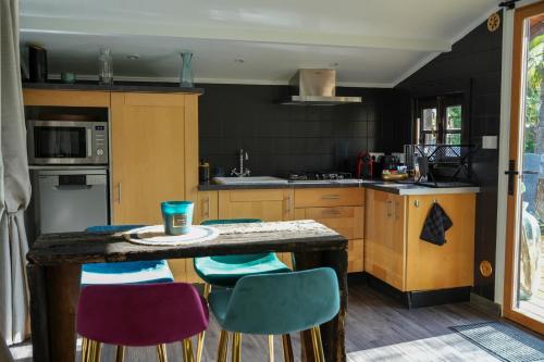 Kuchyň nebo kuchyňský kout v ubytování Cottage, Lodge & Spa