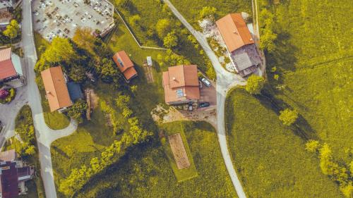 an overhead view of a house and a road at Apartment and Room Natasa in Kobarid