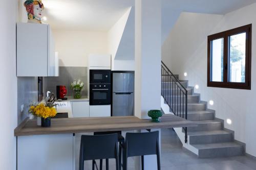 Η κουζίνα ή μικρή κουζίνα στο Casa B, Room 3 - mit Pool - at Lagoon - Lo Stagnone Kite Spot - Palm Kite Paradise