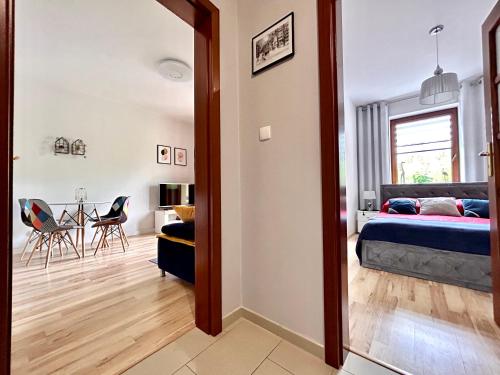 Posteľ alebo postele v izbe v ubytovaní Apartament Klaudia Polanica-Zdrój