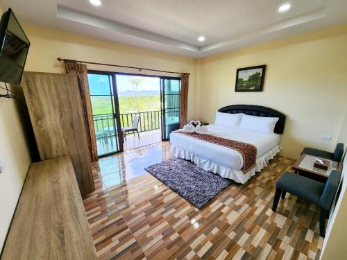 Postel nebo postele na pokoji v ubytování So View Phuket Resort