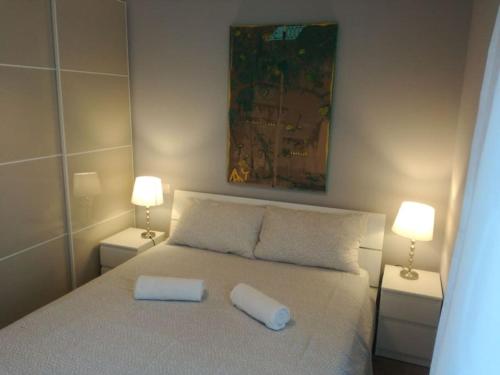 Un pat sau paturi într-o cameră la Suite MM3/Repubblica, 2 min. da Staz. Centrale (C2)