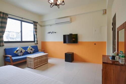 Ένα ή περισσότερα κρεβάτια σε δωμάτιο στο Avenue B&B