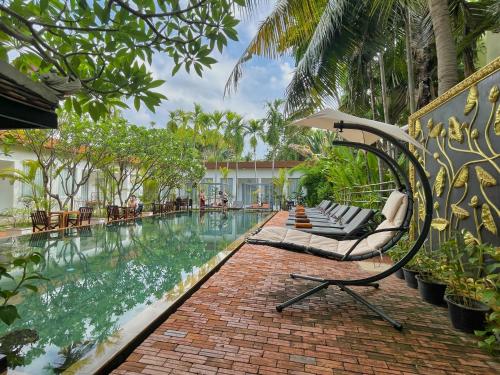 Bazén v ubytování Home Indochine d'Angkor Hotel nebo v jeho okolí