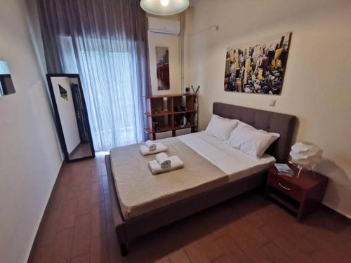 Katil atau katil-katil dalam bilik di Comfy APT in Chania City Center