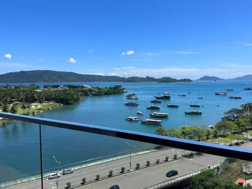 a view of a river with boats in the water at Mari Mari Homestay - IMAGO THE LOFT in Kota Kinabalu