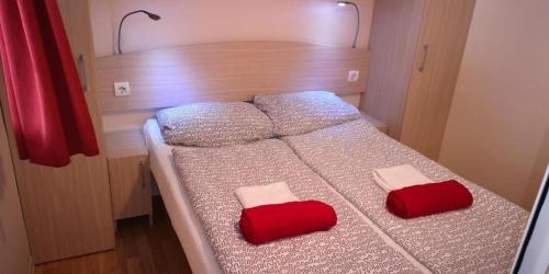Postel nebo postele na pokoji v ubytování Rose PB -Mobile Home